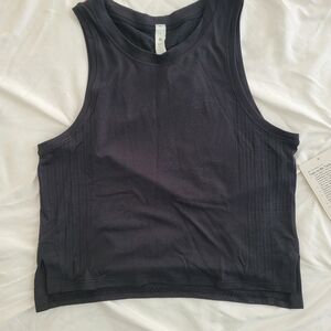 Lululemon train to be tank black size 4